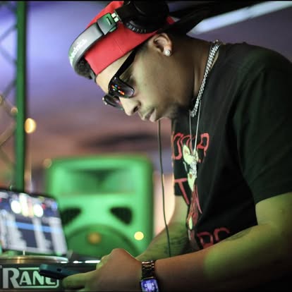 DJ Endy on the decks with green lighting